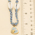 Stainless Steel Sea Life Coin And Puka Shell Charms Braided